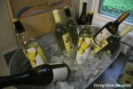 Bottles of white wine in a tub of ice